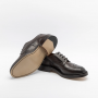 Stringata derby Tricker's Bourton in pelle marrone (suola cuoio)